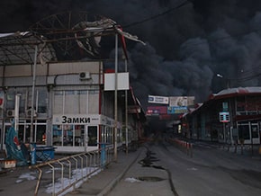 As a result of an artillery strike, an extensive fire broke out in the Kharkov market – photo 06